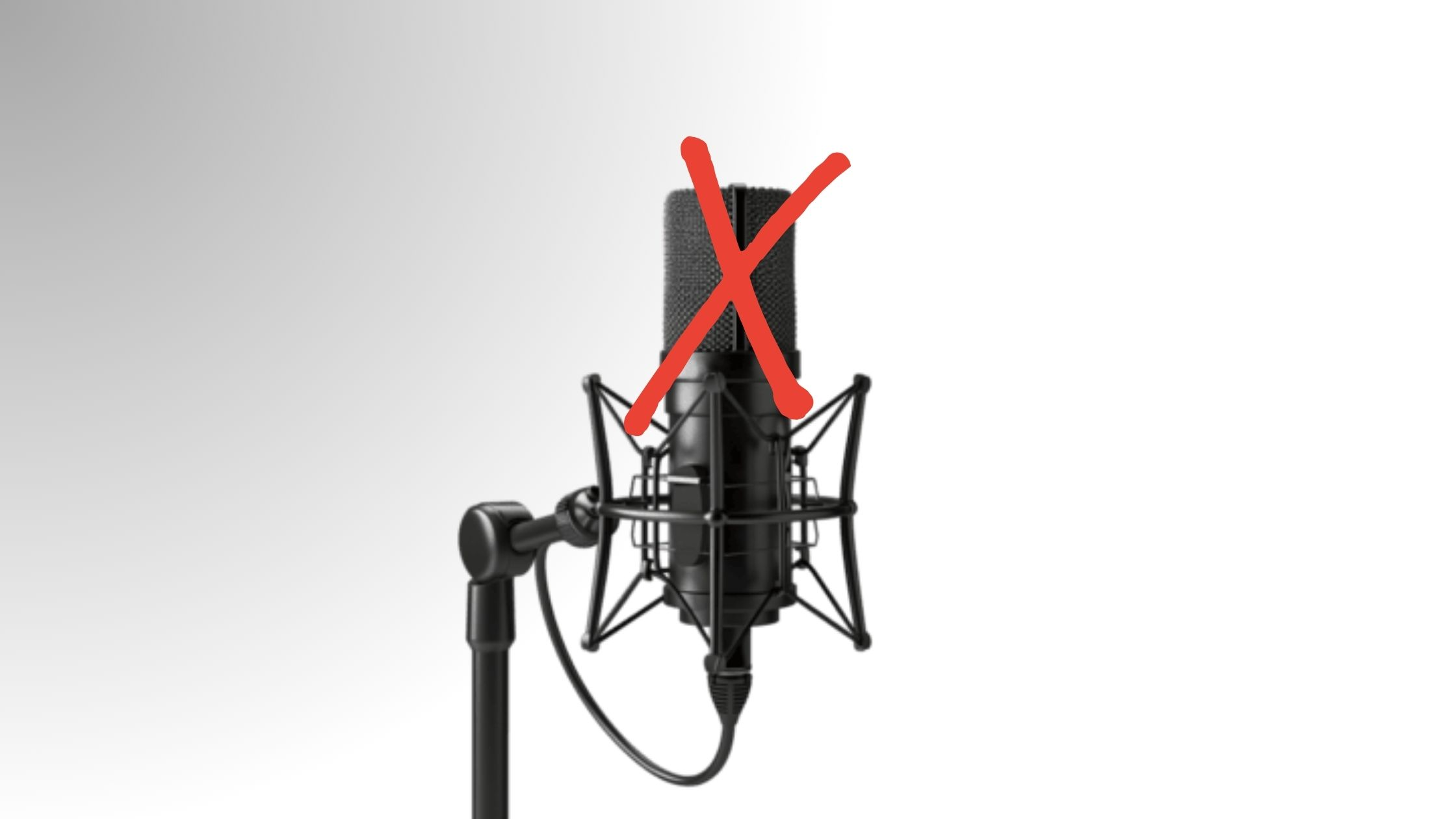A studio microphone with a red X over it